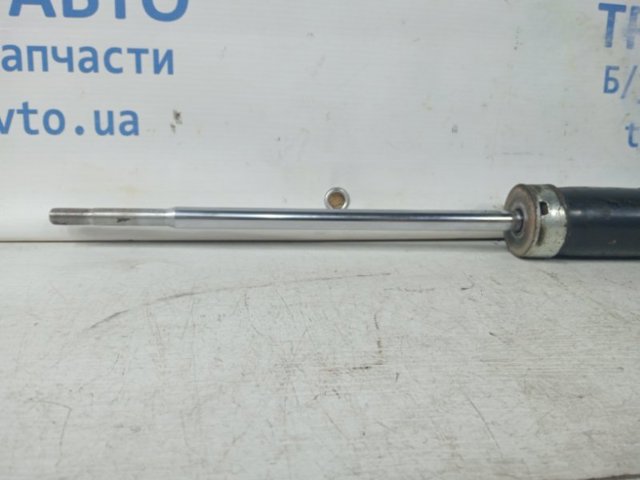 Амортизационная стойка задняя EH1428910 MAZDA