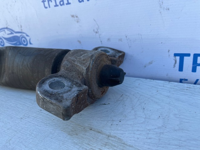 Стойка амортизатора задняя F2GZ18125N FORD