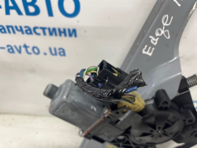 FT4Z5823209F Стеклоподъемник передней левой двери купить Житомир