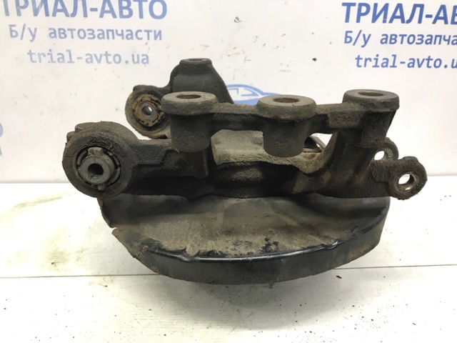 Цапфа (поворотный кулак) задний левый GHR12612XA MAZDA