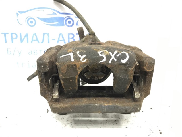 Задний левый суппорт K0Y12699Z MAZDA