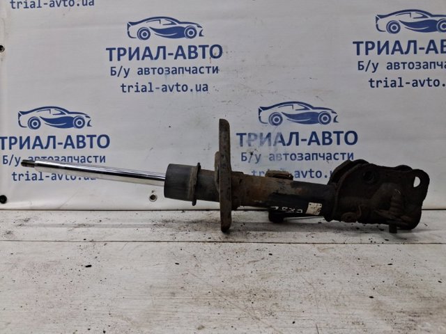 Амортизатор подвески передний левый KA0T34900A MAZDA
