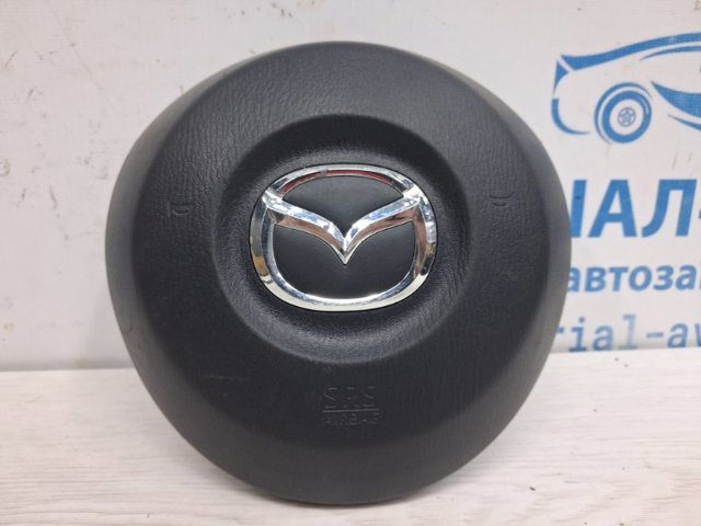 Подушка в руле KD4557K00B02 MAZDA