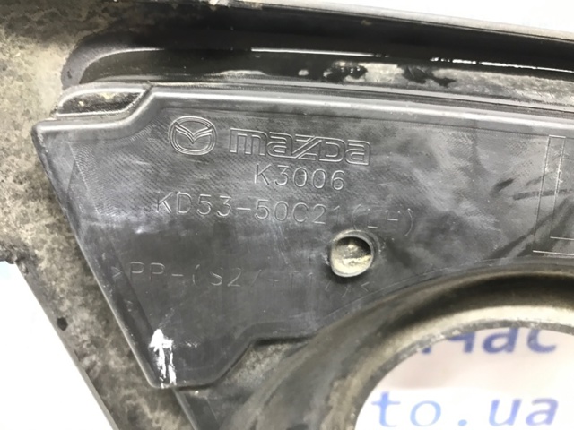 KD5350C21 MAZDA Заглушка (решетка) противотуманных фар бампера переднего левая купить в Тернополь