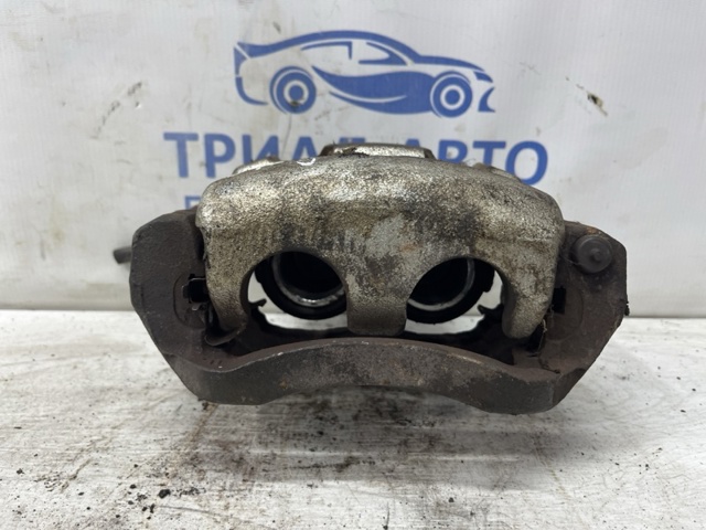 Суппорт тормозной, передний, правый L23233980F MAZDA