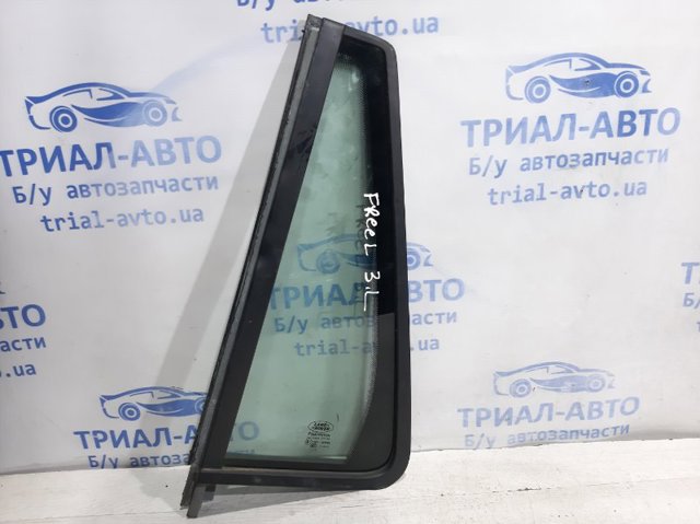 Форточка двери треугольник, задней, левой LR044701 LAND ROVER