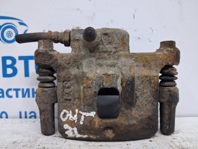 Суппорт тормозной левый задний MR955065 MITSUBISHI