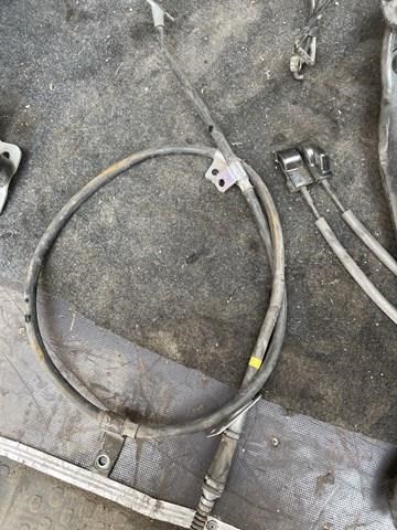 Трос стояночного тормоза задний правый 597703Q300 HYUNDAI