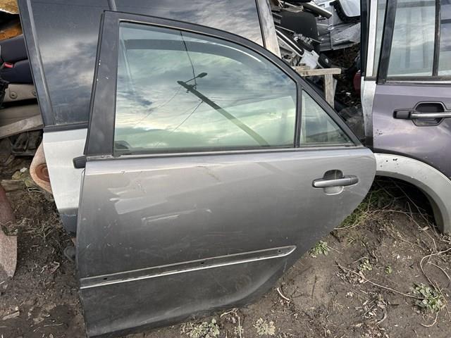Замок задней двери, левой 6906033071 TOYOTA