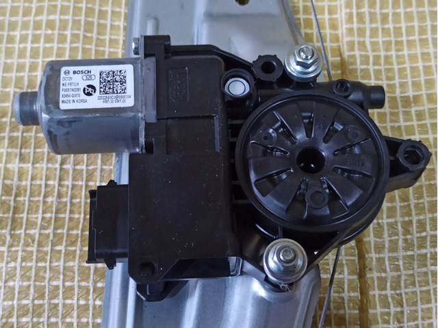 Мотор стеклоподъемника водительской двери 82450GI010 HYUNDAI