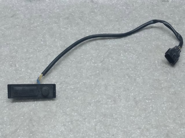 Кнопка привода замка третей/пятой двери 253804EA0A NISSAN