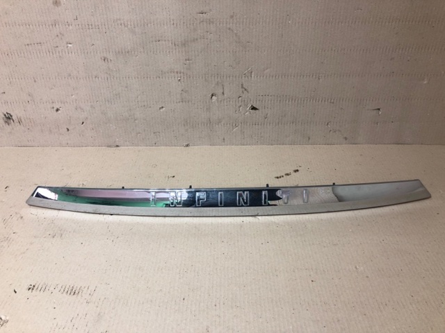 Фонарь подсветки заднего номера 265108991B NISSAN