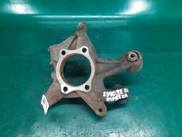 Цапфа (поворотный кулак) задний правый 28411FG000 SUBARU