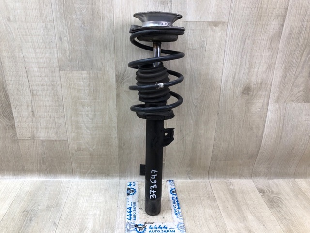 Амортизатор передний левый 31316786003 BMW