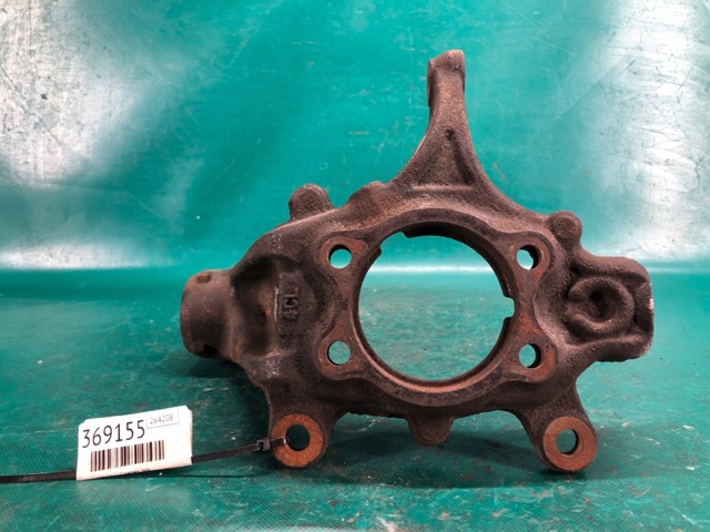 Цапфа - поворотный кулак передний, левый 400154CE0A NISSAN