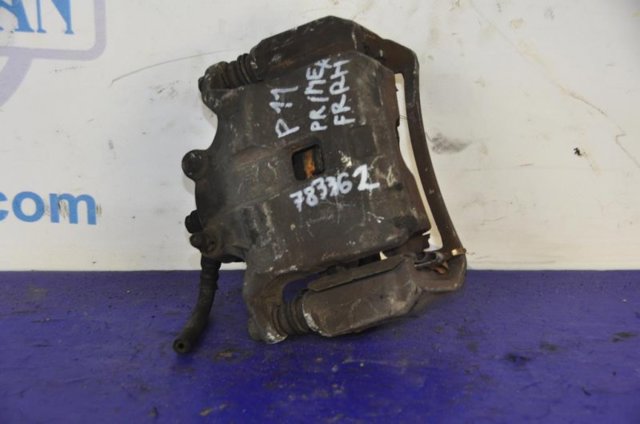 Суппорт тормозной передний правый 410012F021 NISSAN