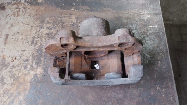 41001WA200 NISSAN Суппорт тормозной передний правый купить в Ирпень