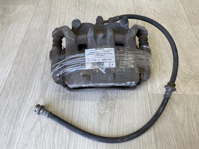 NISSAN 410113LM1A Суппорт тормозной передний левый в наличии Ирпень