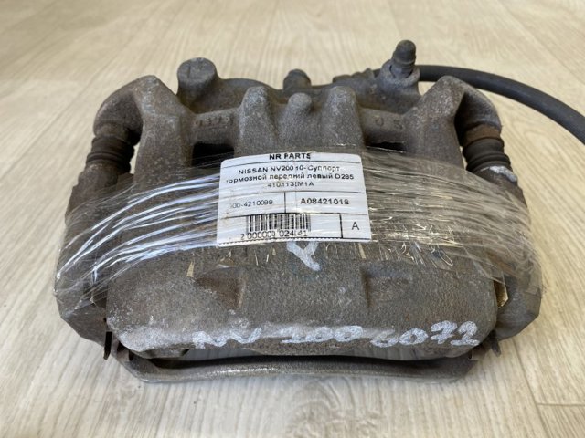 410113LM1A NISSAN Суппорт тормозной передний левый купить в Ирпень