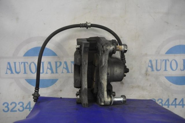 NISSAN 410113TA0A Суппорт тормозной передний левый в наличии Житомир