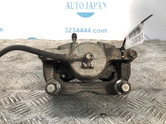 NISSAN 410114EA0A Суппорт тормозной передний левый в наличии Черновцы