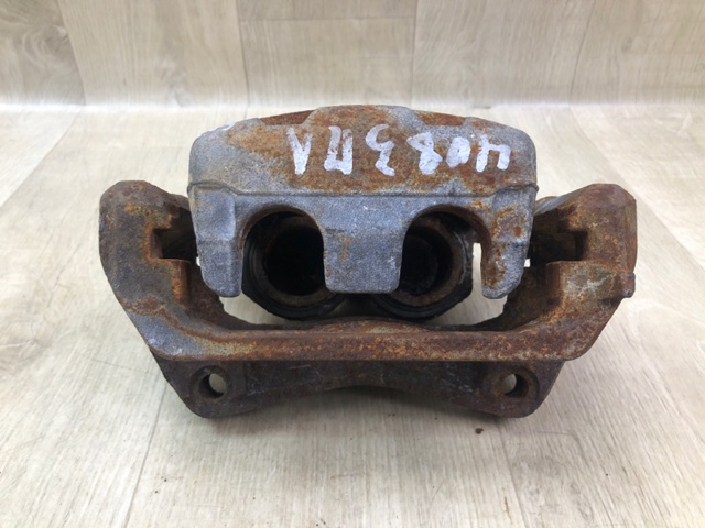 41011EJ20A NISSAN Суппорт тормозной передний левый купить в Киев
