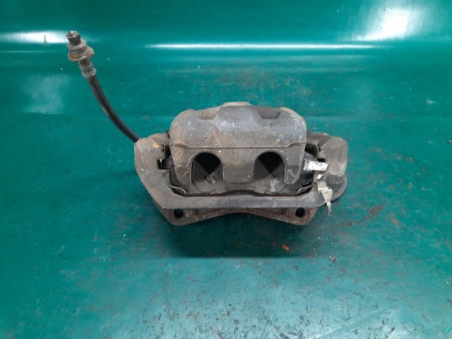 41011EJ20A NISSAN Суппорт тормозной передний левый купить в Чернигов