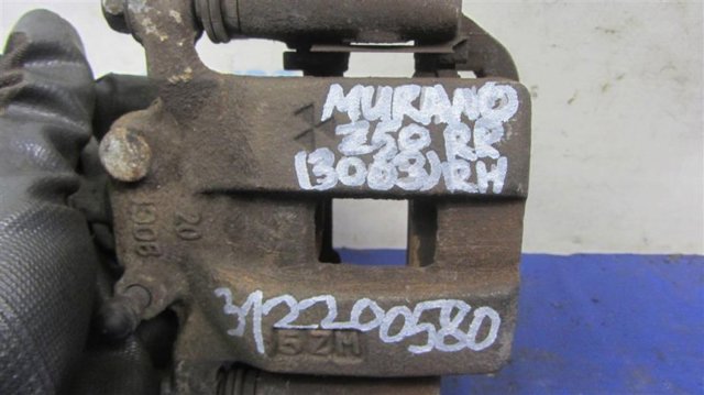 Задний правый суппорт 44001CB10A NISSAN