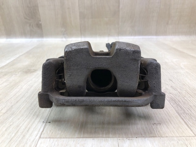 44011CG012 NISSAN Суппорт тормозной задний левый купить в Харьков