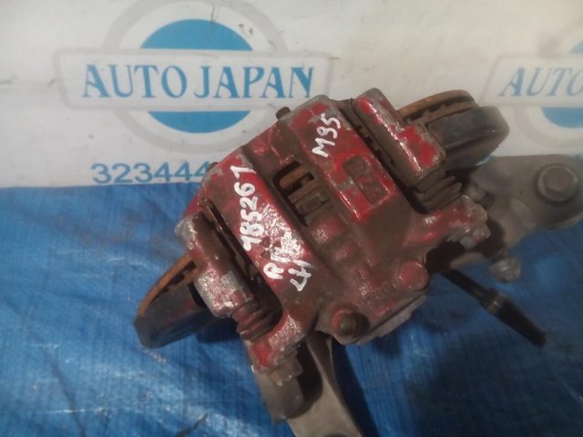 Тормозной суппорт задний левый 44011EG50A NISSAN