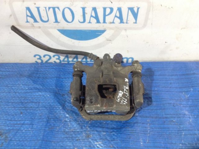 Суппорт тормозной левый задний 44011JA01A NISSAN
