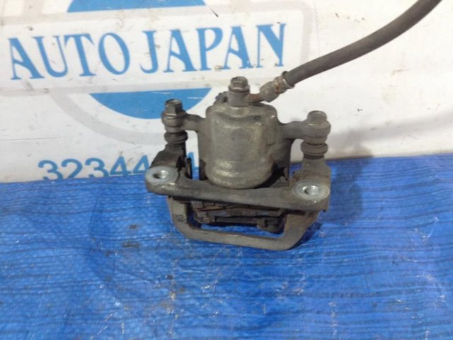 44011JA01A NISSAN Суппорт задний левый купить в Украина