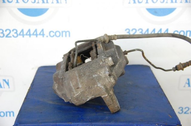 Суппорт тормозной, передний, левый 477500C030 TOYOTA