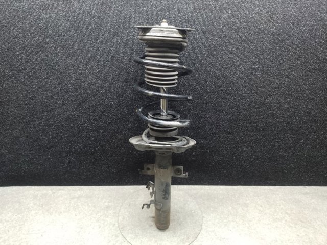 Стойка передняя левая 543034EA3A NISSAN