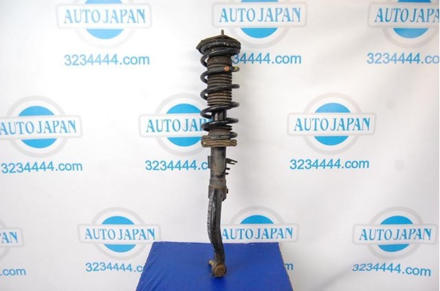 Амортизаторная стойка передняя левая 56110AC526 NISSAN