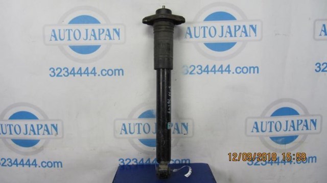 Амортизатор передней подвески правый 562101CA0C NISSAN