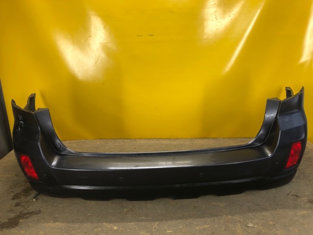 Задний бампер 57704AJ020 SUBARU