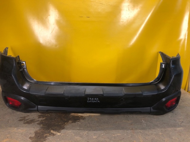 Бампер задний 57704AL130 SUBARU