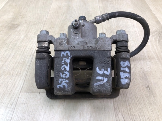 Задний левый суппорт 58210D3000 HYUNDAI