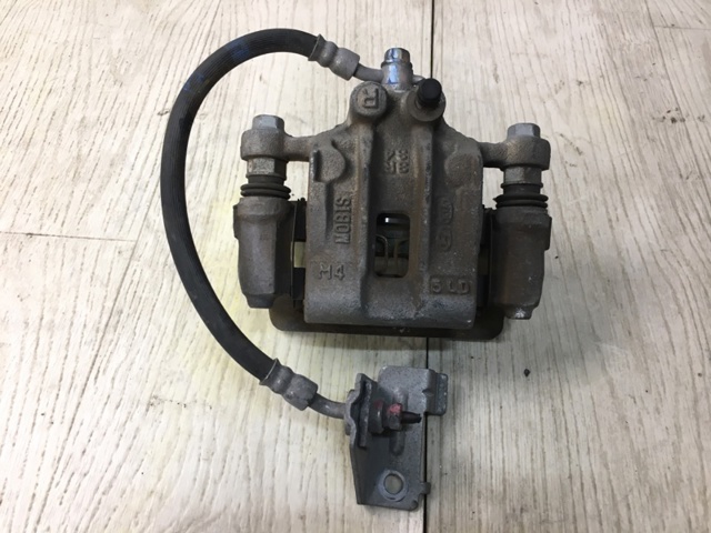 Тормозной суппорт правый задний 58230D4500 HYUNDAI