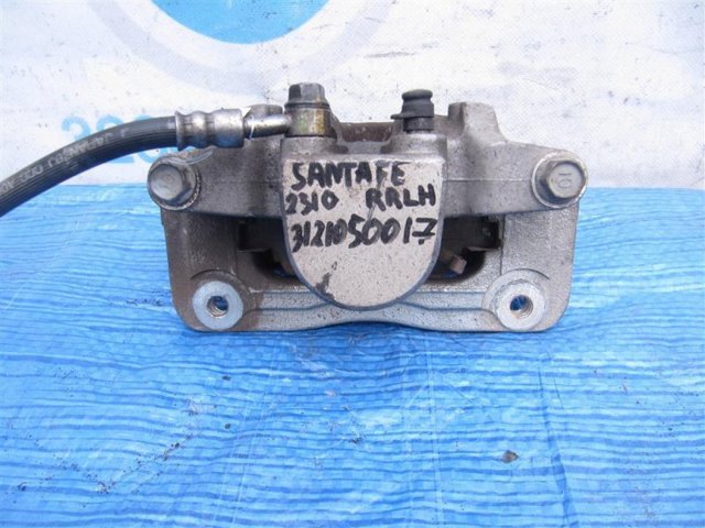 583102WA01 HYUNDAI Суппорт задний левый купить в Ирпень