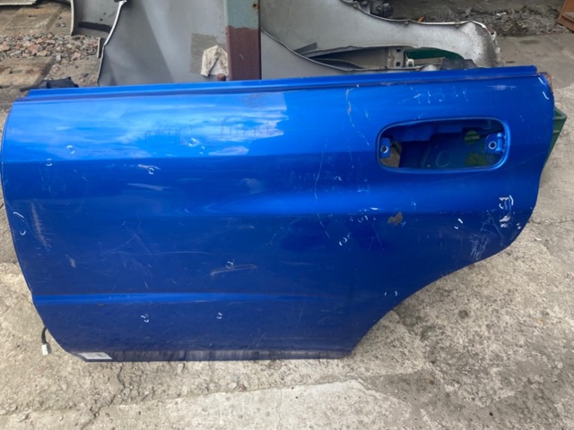 Задняя левая дверь 60409FE052 SUBARU