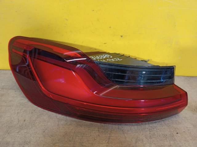 Задний левый внешний фонарь 63217409395 BMW