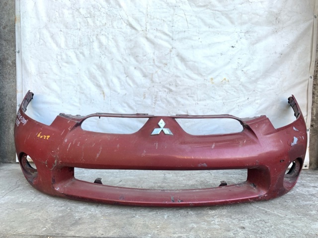 Кожух бампера переднего 6400B274 MITSUBISHI