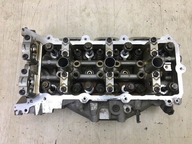 Головка блока цилиндров (ГБЦ), левая 68141353AC CHRYSLER