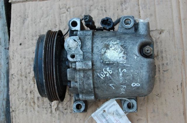 Компрессор системы кондиционирования 73111FE020 SUBARU