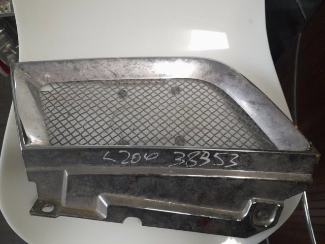 Решетка радиатора левая 7450A569 MITSUBISHI