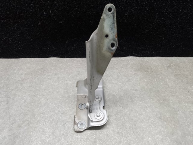 Левая петля капота 7T4Z16797A FORD