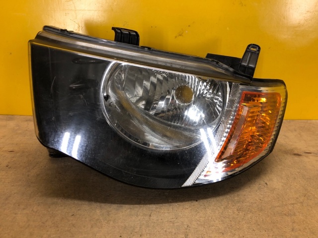 Фара левая передняя 8301A691 MITSUBISHI