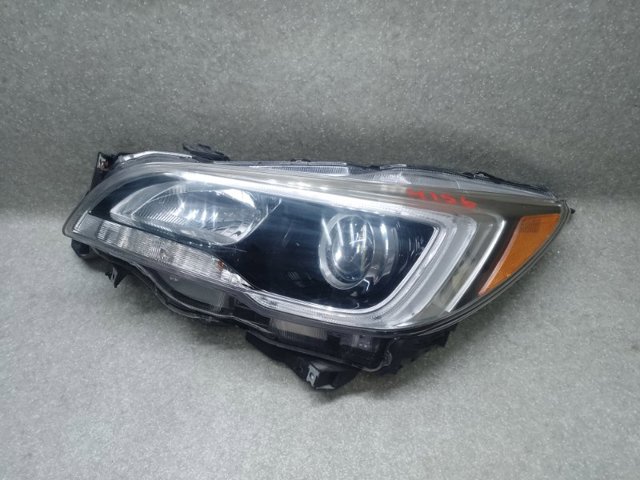 Фара левая 84001AL03A SUBARU